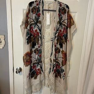 Beautiful throw over shrug/poncho